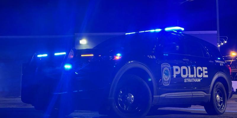 Police car with the lights on.